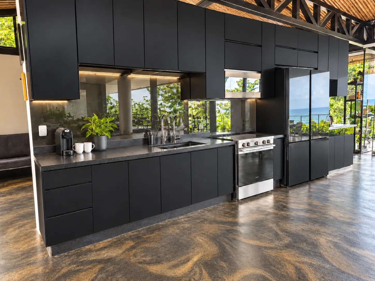 Full black kitchen inside the Rooftop Penthouse at Hotel VOS