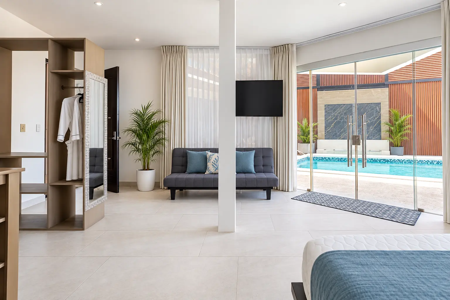 Suite 2 lounge with pool-level access