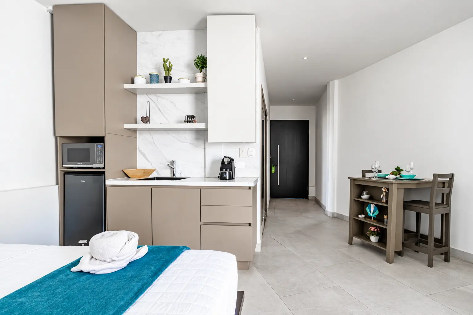 Suite 3 kitchenette and indoor dining area
