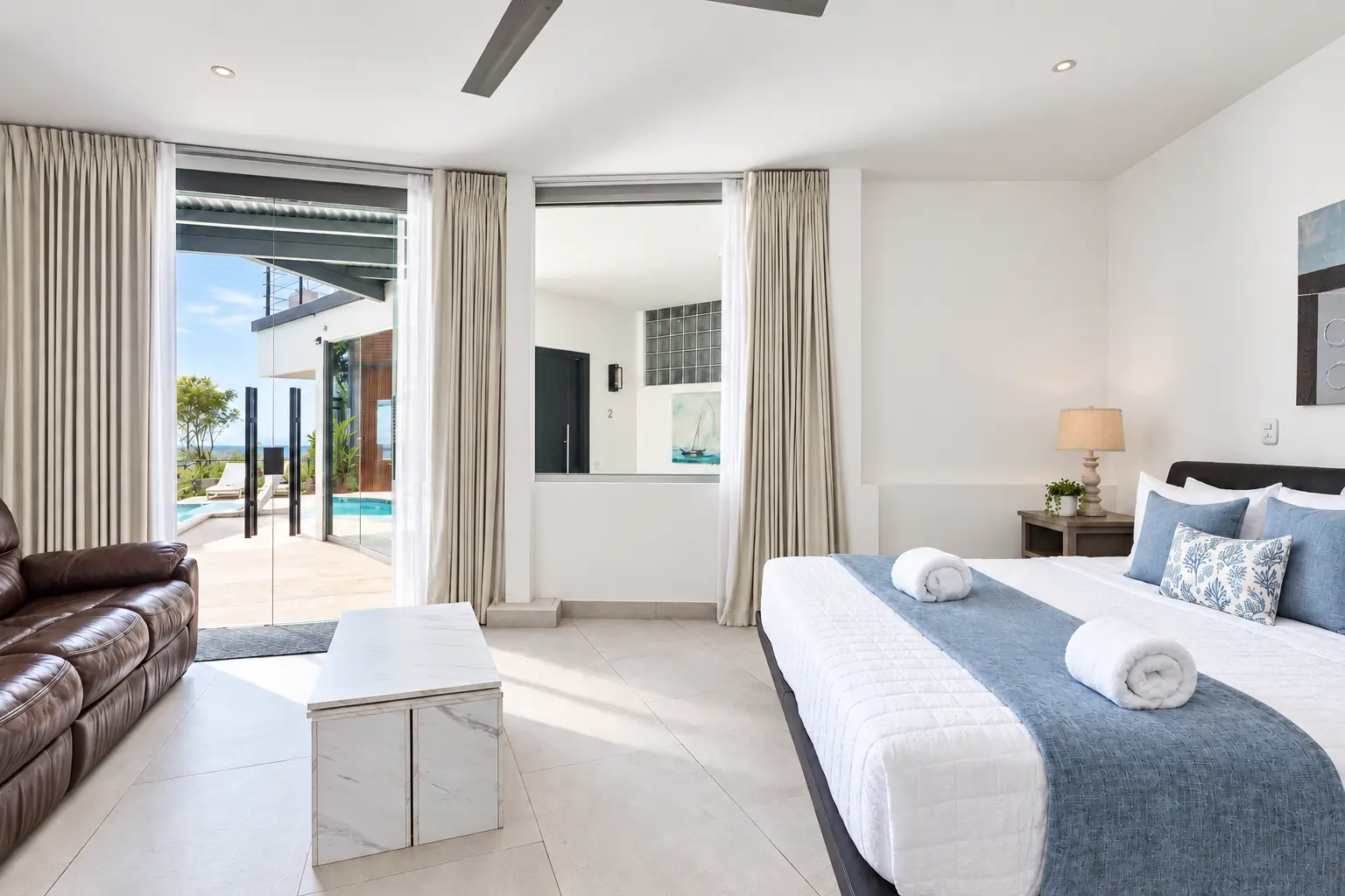 Suite 3 bedroom with pool-level access and partial Pacific Ocean view