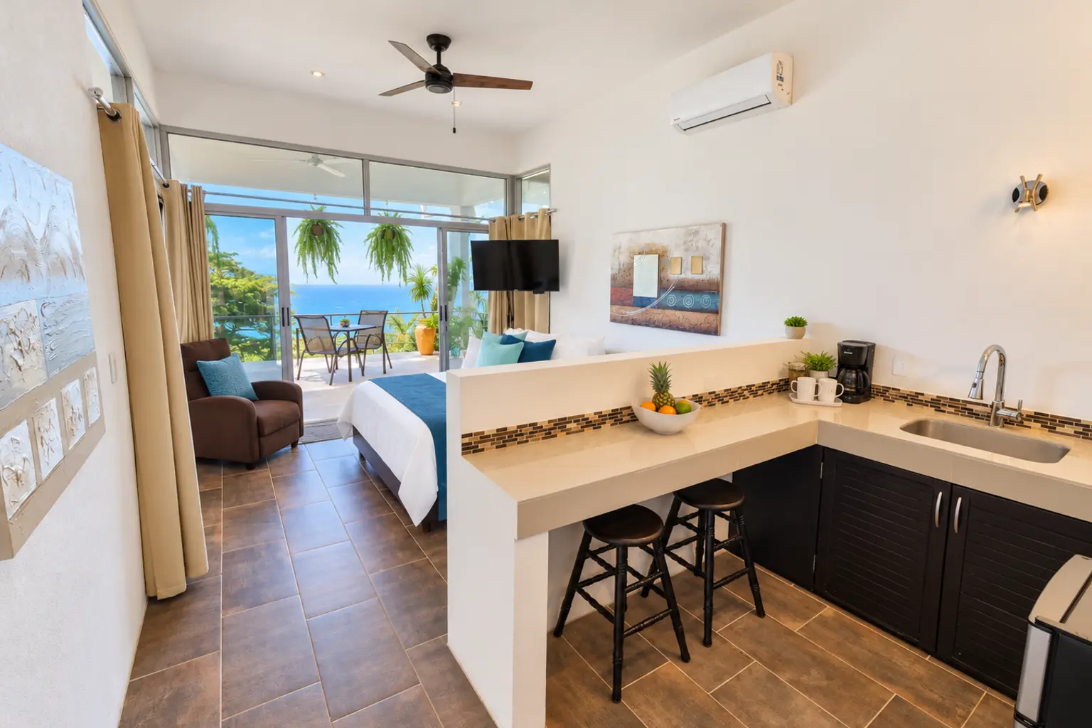 Suite 5 open-plan kitchenette with ocean view