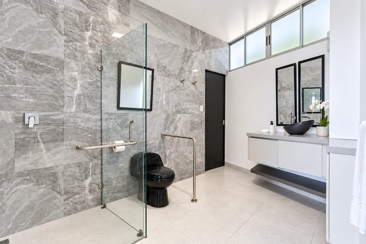 Suite 9 bathroom vanity and accessible walk-in shower